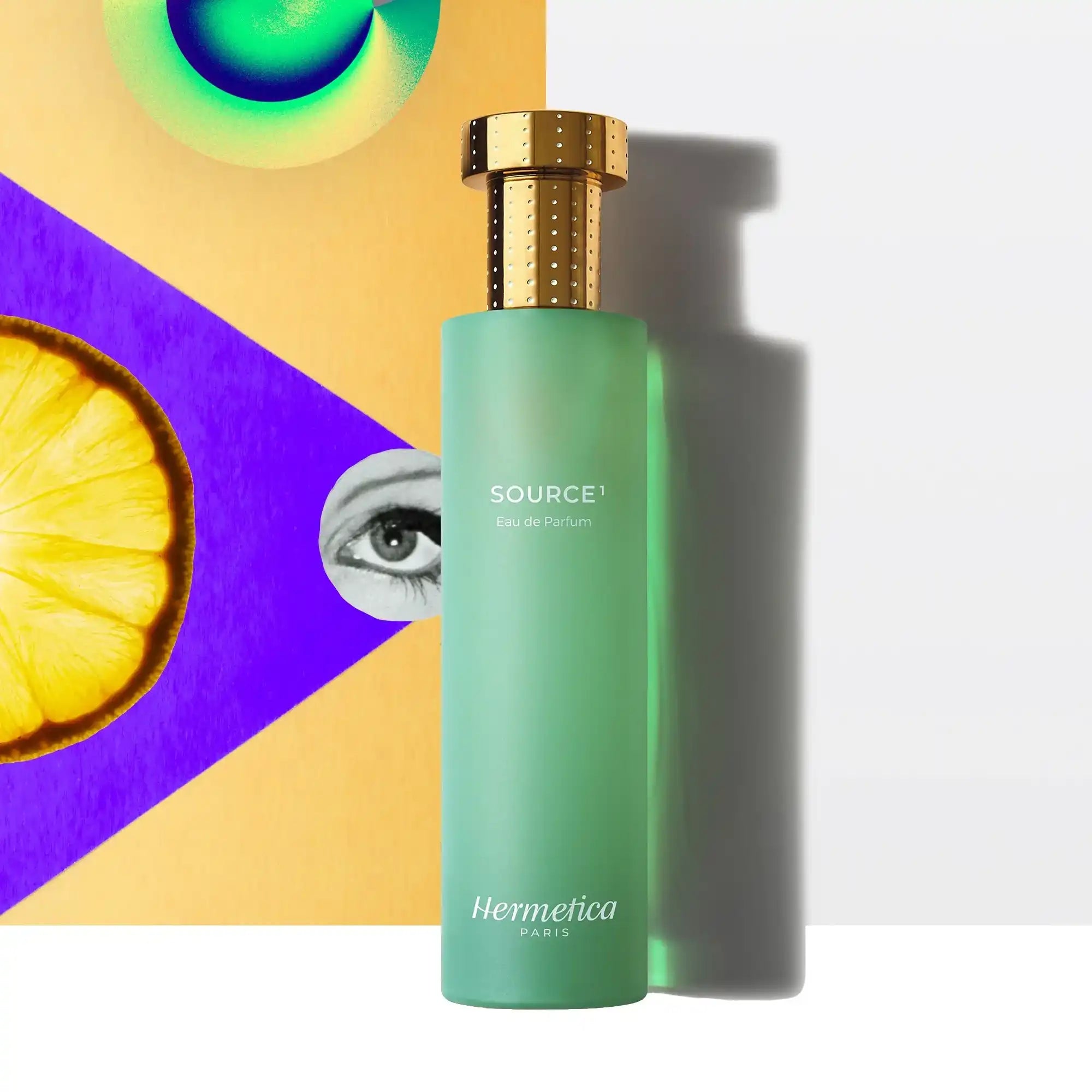 Mint green perfume bottle with a gold metallic cap.